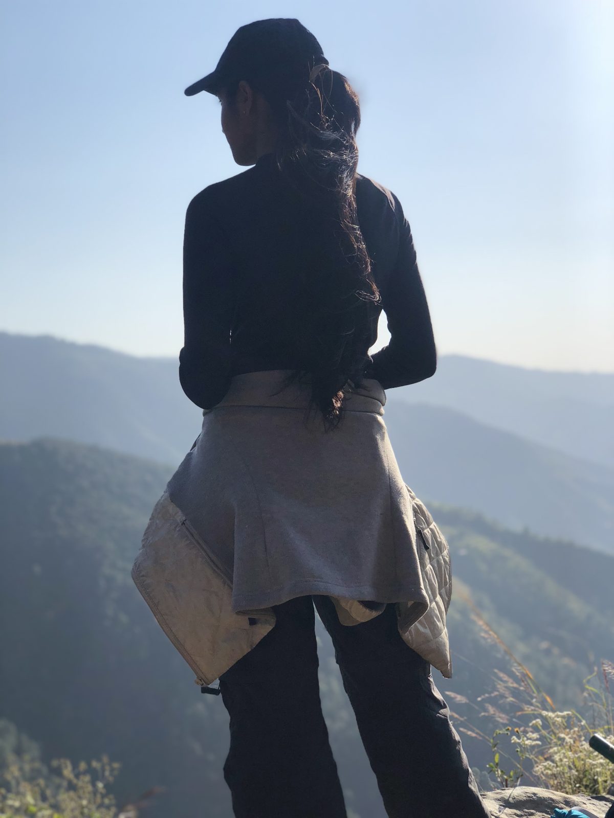Sloka standing on a mountain ridge in North India